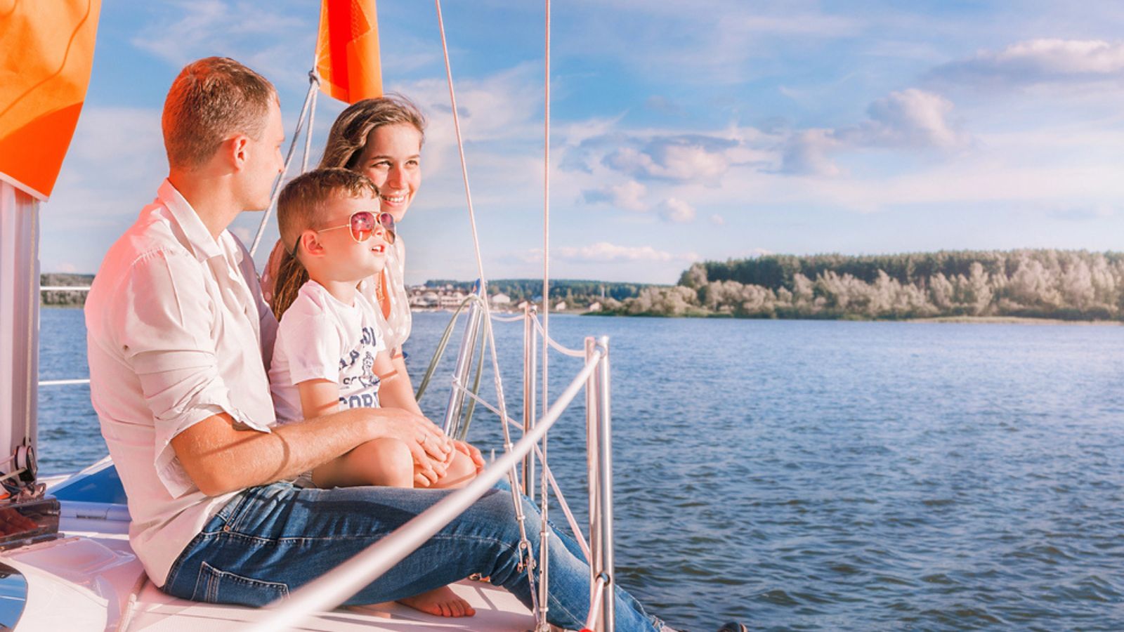 Family yacht trip in sunny weather. Horizontal photo. Travel Concept