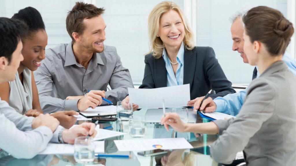 Happy Business People in Meeting. Work Concept
