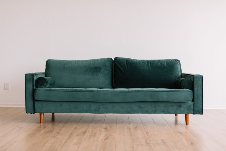 teal couch listed for sale