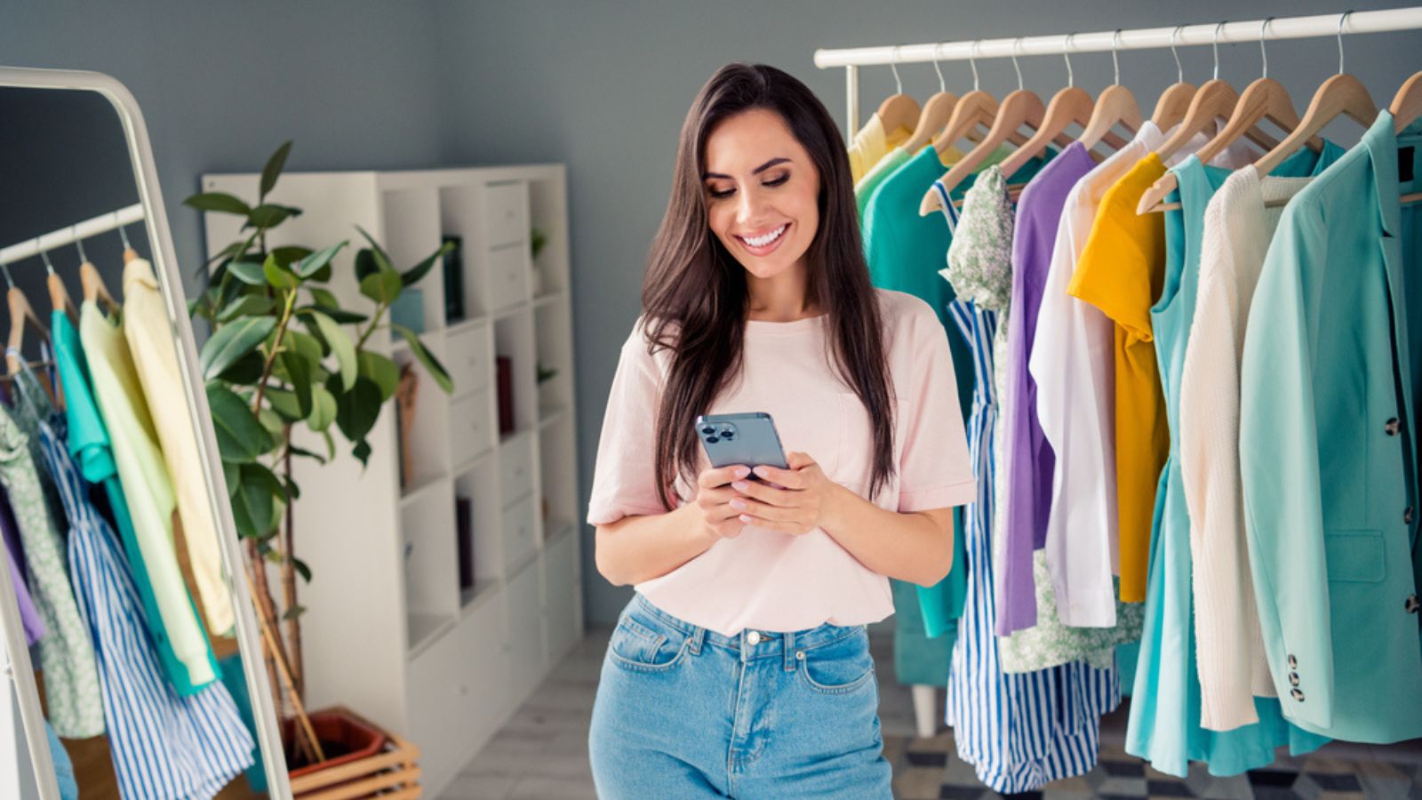 Photo of charming sweet young lady dressed pink t-shirt online shopping bargains modern device indoors house room