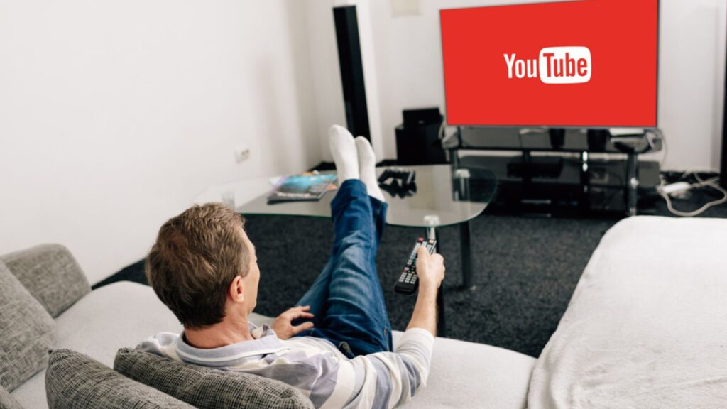 man watching tv youtube couch living room