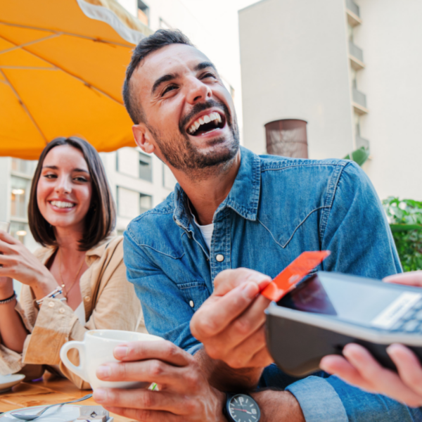 couple out to lunch spending money happy credit card coffee