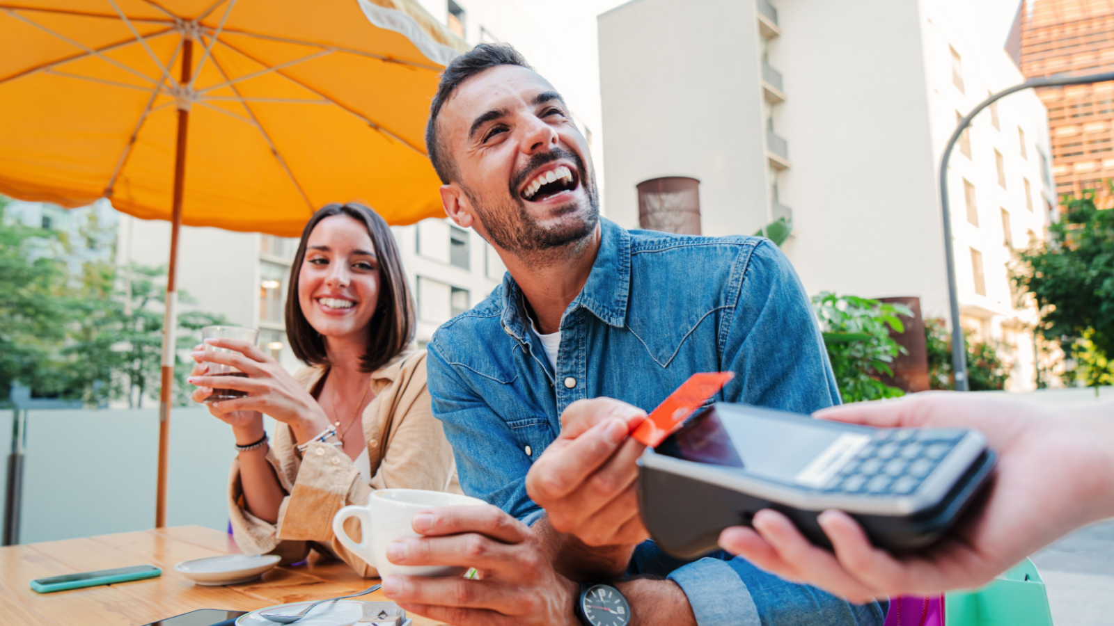 couple out to lunch spending money happy credit card coffee